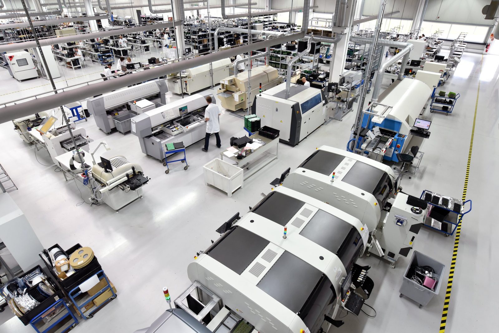Overhead view of a busy electronics production floor